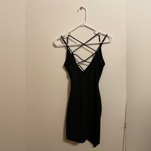 Mini black criss-cross back dress by Mind Code (S/P)